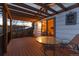 Inviting deck with pergola and sunset views featuring a table and chairs, great for relaxing outdoors at 4917 S Xenophon Way, Morrison, CO 80465