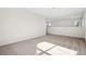 Carpeted bonus room with neutral paint at 12997 Wyandot Way, Westminster, CO 80234