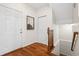Entryway with hardwood floors, closet and staircase at 12997 Wyandot Way, Westminster, CO 80234