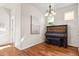 Charming living room with wood floors, piano, and natural light at 12997 Wyandot Way, Westminster, CO 80234