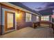 Cozy back deck featuring access to the house through a glass door at 12997 Wyandot Way, Westminster, CO 80234