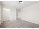 Bedroom featuring neutral walls, carpet, and large closet with shelving at 12997 Wyandot Way, Westminster, CO 80234