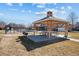 Community amenities including covered poolside picnic tables and grilling spaces, perfect for gatherings with friends and Gathering at 12997 Wyandot Way, Westminster, CO 80234