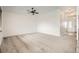 Expansive bedroom featuring plush carpeting, ceiling fan and ample natural light. Ready for personalization at 3572 Lissa Dr, Berthoud, CO 80513