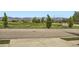 Scenic view of the Heron Pointe neighborhood, showcasing lush greenery and the community entrance sign at 3572 Lissa Dr, Berthoud, CO 80513