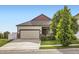 Charming single-Gathering home featuring a well-manicured lawn, two-car garage, and tasteful exterior finishes at 3572 Lissa Dr, Berthoud, CO 80513