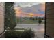 Beautiful morning shot of the community street, with distant mountains, trees and sunrise sky views at 3572 Lissa Dr, Berthoud, CO 80513