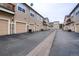 View of multiple garages with carriage doors in a neat complex; offering convenient parking at 3912 S Carson St # 204, Aurora, CO 80014