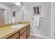 Bathroom with vanity and large mirror at 5543 S Kenton Ct, Englewood, CO 80111