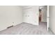 Neutral bedroom features plush carpeting and a double closet at 5543 S Kenton Ct, Englewood, CO 80111