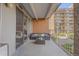 Relaxing balcony featuring a comfortable seating area at 955 Eudora St # 203E, Denver, CO 80220
