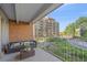 Cozy balcony showcasing outdoor seating with garden view at 955 Eudora St # 203E, Denver, CO 80220
