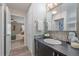 Updated bathroom with sleek vanity and mirrored medicine cabinet at 955 Eudora St # 203E, Denver, CO 80220
