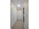 Bright hallway featuring tile floors, white closets and doors at 955 Eudora St # 203E, Denver, CO 80220