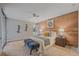 Charming main bedroom with a brick wall and neutral decor at 955 Eudora St # 203E, Denver, CO 80220