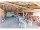 Interior view of the barn with storage for equipment, tractors, and farm tools at 11499 County Road 40 1/2 Rd, Platteville, CO 80651