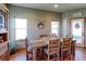 Inviting dining room with a rustic wooden table, decorative accents, and natural light at 11499 County Road 40 1/2 Rd, Platteville, CO 80651