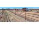 Fenced horse property with horse in pen and shelter in background on a sunny day at 11499 County Road 40 1/2 Rd, Platteville, CO 80651