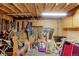Interior view of the tack room filled with horse riding equipment, feed, and storage cabinets at 11499 County Road 40 1/2 Rd, Platteville, CO 80651