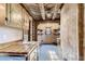 Adobe kitchen showcases wood cabinets, wood floors and a unique design creating a cozy retreat at 10426 Tomahawk Rd, Parker, CO 80138