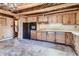 A functional kitchen featuring wood cabinets and modern appliances at 10426 Tomahawk Rd, Parker, CO 80138