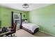Inviting bedroom with a single bed, desk, and fun, colorful decor at 4515 W 107Th Cir, Westminster, CO 80031