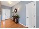 Welcoming entryway with hardwood floors and stylish decor leading into the home at 4515 W 107Th Cir, Westminster, CO 80031