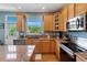 Well-appointed kitchen features modern appliances, granite countertops, and abundant natural light at 4515 W 107Th Cir, Westminster, CO 80031