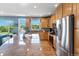 Spacious kitchen boasts stainless steel appliances, granite countertops, and ample cabinet space at 4515 W 107Th Cir, Westminster, CO 80031