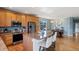 Modern kitchen with stainless steel appliances, granite countertops, and an island with seating at 4515 W 107Th Cir, Westminster, CO 80031