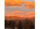 Scenic sunset view overlooking mountains and landscape creating a picturesque and serene backdrop at 4515 W 107Th Cir, Westminster, CO 80031