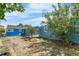 View of the expansive backyard, highlighting the home's exterior and outdoor space at 935 S Pecos Way, Denver, CO 80223