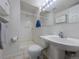 Well-lit bathroom with a shower and sink, providing essential amenities at 5369 Creek Way, Parker, CO 80134
