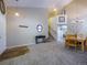 Open-concept living room boasts abundant natural light, staircase, and dining area, perfect for entertaining and Gathering gatherings at 5369 Creek Way, Parker, CO 80134