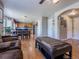 Open-concept living and kitchen area features a cozy living room and a modern kitchen at 5369 Creek Way, Parker, CO 80134