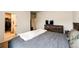 Comfortable bedroom with rustic wood furnishings and access to a walk-in closet at 316 Maple St, Bennett, CO 80102