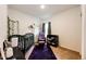 Bedroom room with a crib, changing table, and accent decor at 316 Maple St, Bennett, CO 80102