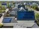 Aerial view showing solar panels on a home in a residential neighborhood at 10822 E 28Th Pl, Denver, CO 80238