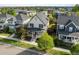 Well-situated home showcasing charming architecture and a meticulously maintained front yard at 10822 E 28Th Pl, Denver, CO 80238