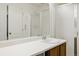 Clean bathroom with a vanity, sink, and shower at 17101 Waterhouse Cir # B, Parker, CO 80134