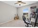 Bedroom with window, ceiling fan, and workspace at 17101 Waterhouse Cir # B, Parker, CO 80134