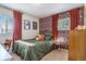 Stylish bedroom with unique wallpaper, dark curtains, and modern furniture for a trendy and cozy ambiance at 2756 S Linley Ct, Denver, CO 80236
