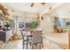 Cozy dining area with large window and charming decor, seamlessly connected to living spaces at 2756 S Linley Ct, Denver, CO 80236