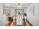 Bright dining room with hardwood floors and a built-in buffet at 12019 W Mexico Ave, Lakewood, CO 80228