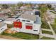 An aerial view of the home showcases the roof deck and outdoor dining area at 4390 Osage St, Denver, CO 80211