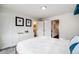 Bright bedroom featuring ample natural light and a minimalist aesthetic with modern furnishings at 4390 Osage St, Denver, CO 80211