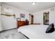 Bedroom with closet, dresser, decor and comfy looking bed with a neutral palette at 4390 Osage St, Denver, CO 80211