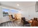 Bright bonus room with large windows, ample natural light, and comfortable seating area perfect for relaxing at 4390 Osage St, Denver, CO 80211