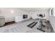 A large bonus room featuring multiple windows and carpeted flooring at 4390 Osage St, Denver, CO 80211