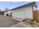 A two car detached garage is accessed by a private back alley at 4390 Osage St, Denver, CO 80211